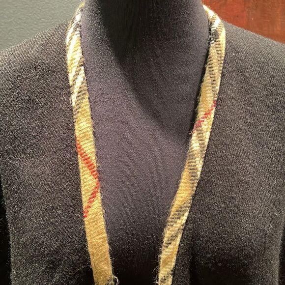 Black soft knit plaid edged cape. 100% acrylic. One size. - Picture 2 of 5